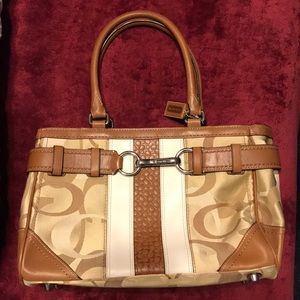 Brown and tan leather Coach purse